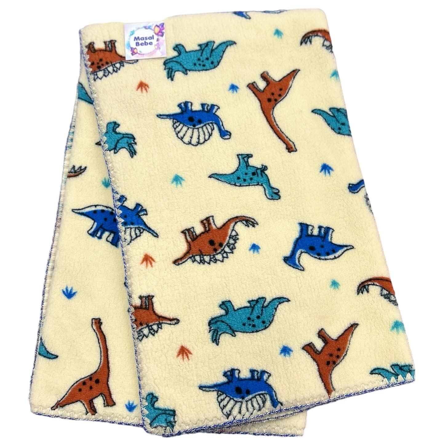 Krem Dinazor Desenli Battaniye